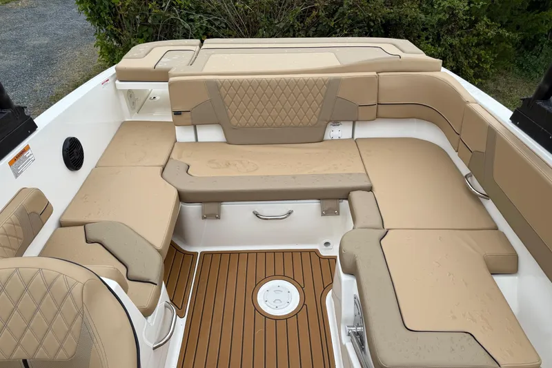 Slide: The Image of 2025 Bayliner VR6 Bowrider I/O with spacious seating and modern interior design. - 5