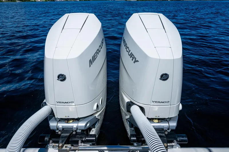 Slide: The Image of Twin Mercury Verado engines on a 2024 SeaVee 322z boat in open water. - 25