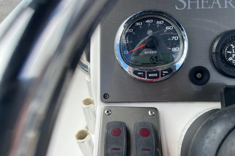 Slide: The Image of Simrad navigation display on 2014 ShearWater 23TE boat, showing map and coordinates. - 14