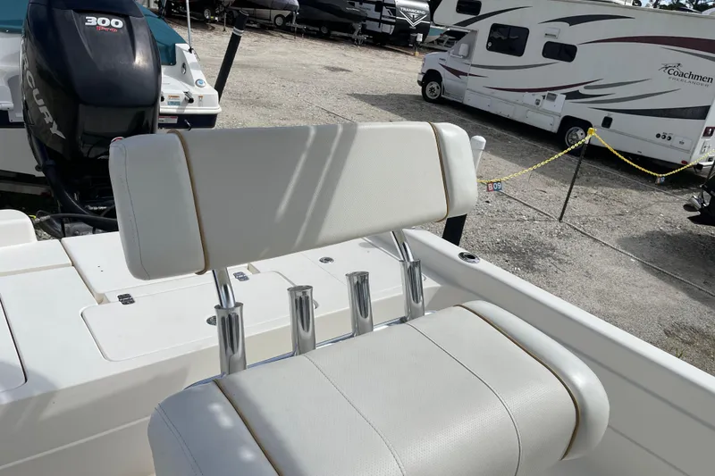 Slide: The Image of VHF marine radio on 2014 ShearWater 23TE boat dashboard, displaying channel 16. - 17