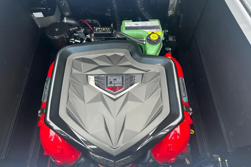 Slide: The Image of 2025 Nautique Super Air Nautique G23 engine with PCM marine cover, showcasing advanced design. - 41