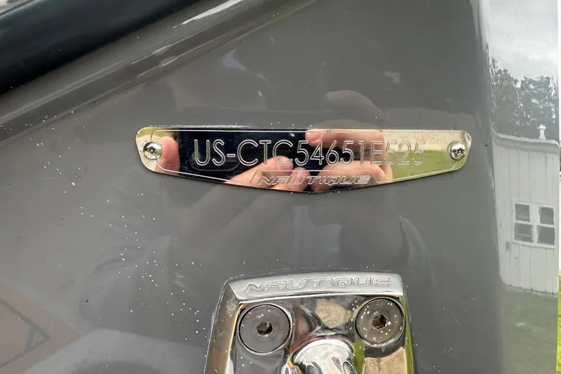 Slide: The Image of 2025 Nautique Super Air Nautique G23 hull identification number plate. - 9