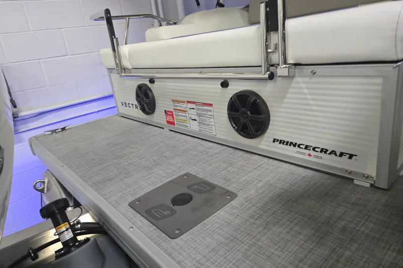 Slide: The Image of 2025 Princecraft Vectra 23 RL boat interior with speakers and seating, showcasing modern design. - 11