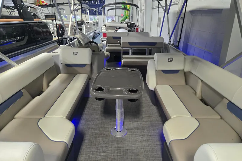 Slide: The Image of 2025 Princecraft Vectra 23 RL pontoon boat interior with spacious seating and modern design. - 5