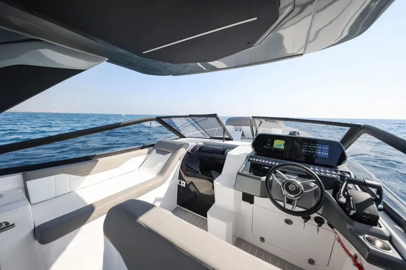 Slide: The Image of Luxury Valiatt 350GT yacht cockpit with modern controls, ocean view, 2025 model. - 7