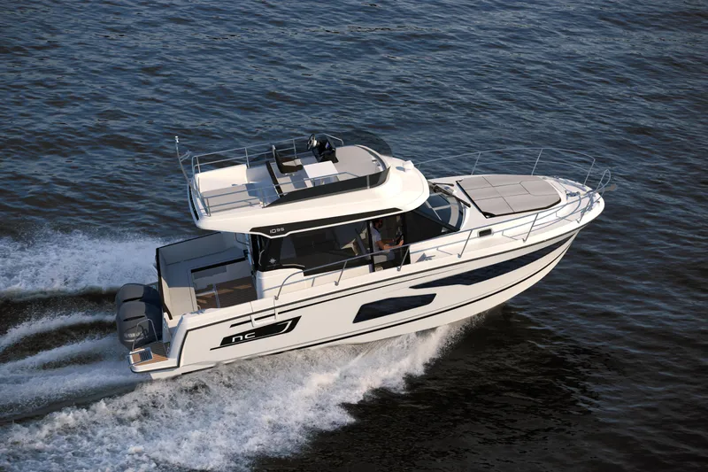 The Image of 2026 Jeanneau NC1095 Fly cruising on open water, showcasing sleek design and powerful performance. - 0