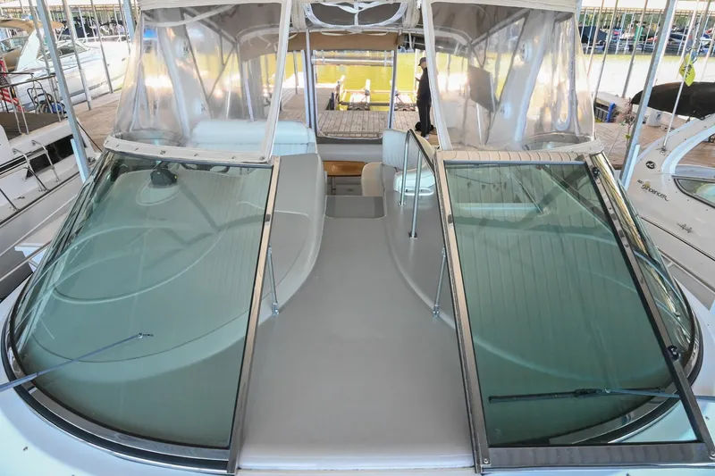 Slide: The Image of 2001 Cruisers Yachts 3672 Express boat with clear windshield and spacious deck area. - 39