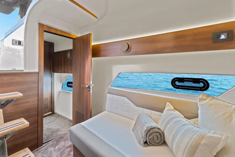 Slide: The Image of Luxurious interior of 2025 Valiatt 380GT yacht with elegant seating and ocean view. - 10