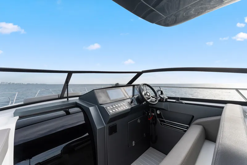 Slide: The Image of Modern Valiatt 380GT boat cockpit with sleek design, 2025 model, on open water. - 14