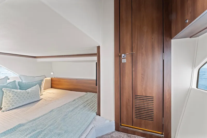 Slide: The Image of Luxurious cabin interior of 2025 Valiatt 380GT yacht with elegant wood finish and cozy bedding. - 20