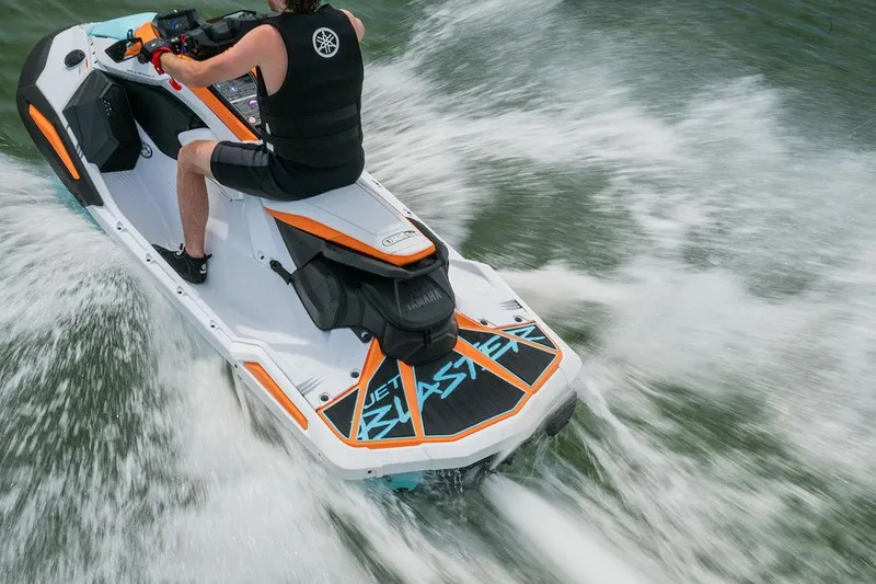 Slide: The Image of Manufacturer Provided Image: Man riding 2026 Yamaha WaveRunner JetBlaster LTD on water, creating splashes. - 4