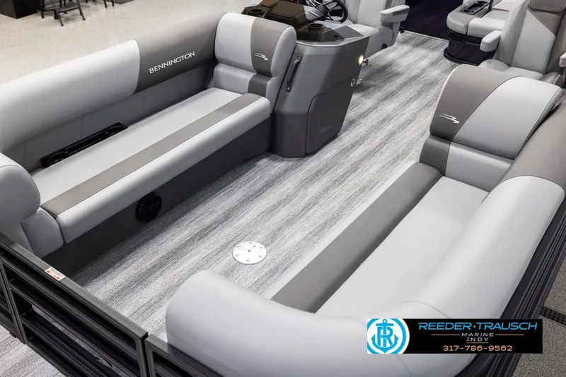 Slide: The Image of 2025 Bennington 21 SSB pontoon boat interior with gray seating and modern design. - 10