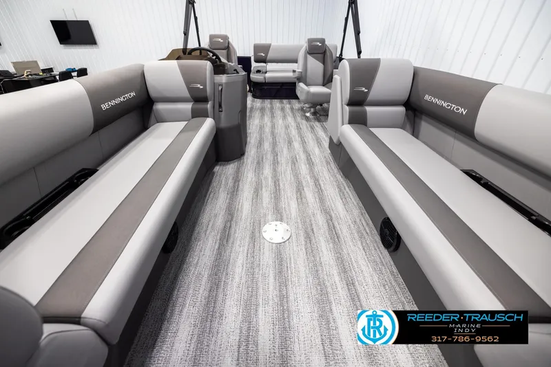 Slide: The Image of 2025 Bennington 21 SSB pontoon boat interior with gray seating and modern design. - 13