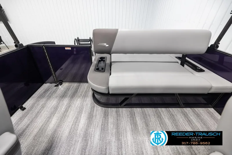 Slide: The Image of 2025 Bennington 21 SSB boat interior with gray seating and carpet flooring. - 15