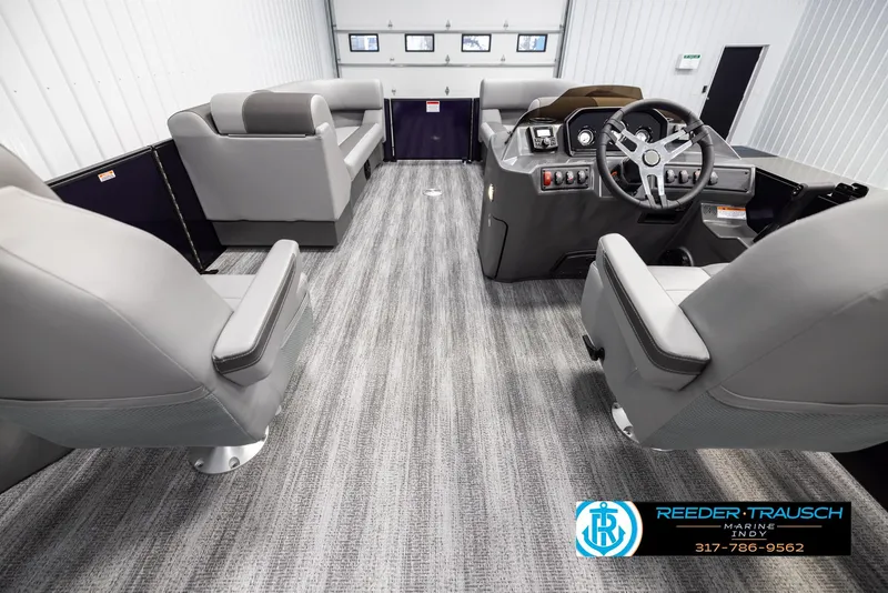 Slide: The Image of Interior of 2025 Bennington 21 SSB pontoon boat with modern seating and steering console. - 17