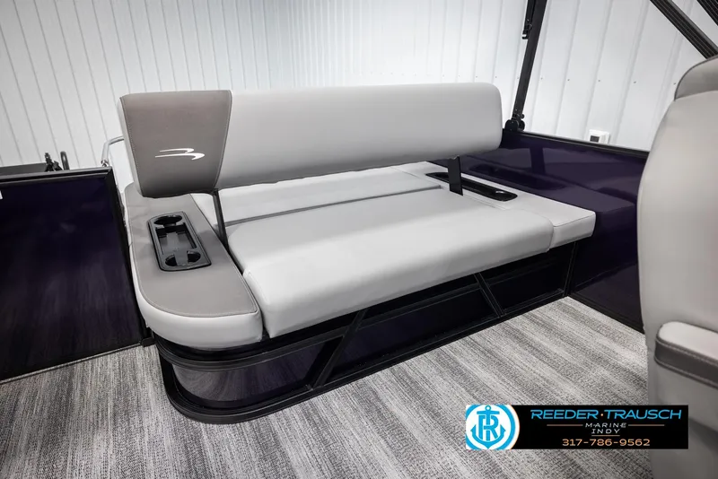 Slide: The Image of 2025 Bennington 21 SSB boat interior with gray seating and cup holders. - 23