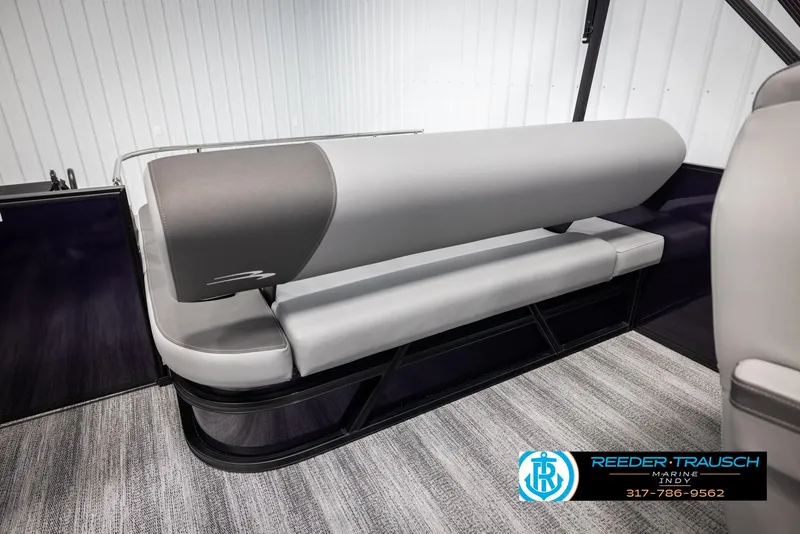 Slide: The Image of 2025 Bennington 21 SSB boat interior seating with gray upholstery and modern design. - 24