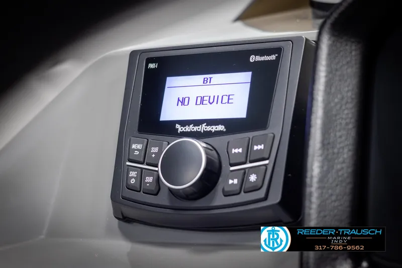 Slide: The Image of 2025 Bennington 21 SSB boat stereo system displaying "No Device" on Bluetooth screen. - 31