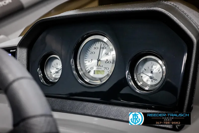 Slide: The Image of Dashboard of 2025 Bennington 21 SSB boat with gauges and logo. - 32