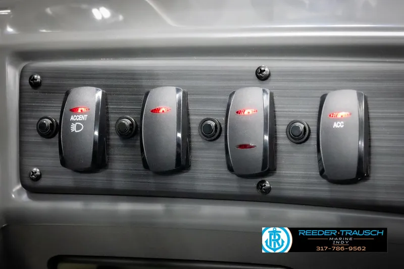 Slide: The Image of Control panel of 2025 Bennington 21 SSB boat with labeled switches. - 33