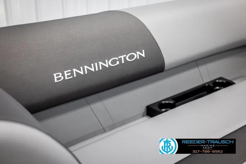 Slide: The Image of 2025 Bennington 21 SSB boat seat with logo and cup holders. - 37