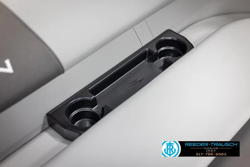 Slide: The Image of 2025 Bennington 21 SSB boat cup holders and storage compartment detail. - 38