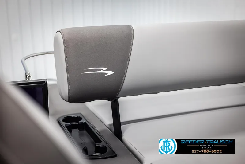 Slide: The Image of 2025 Bennington 21 SSB boat seat with logo, featuring cup holders and sleek design. - 41