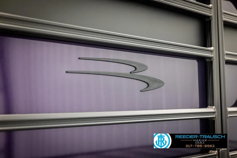 Slide: The Image of 2025 Bennington 21 SSB boat with sleek design and logo detail. - 45