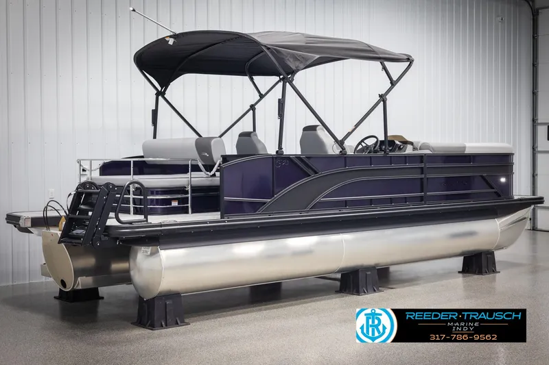 Slide: The Image of 2025 Bennington 21 SSB pontoon boat with canopy in showroom. - 6