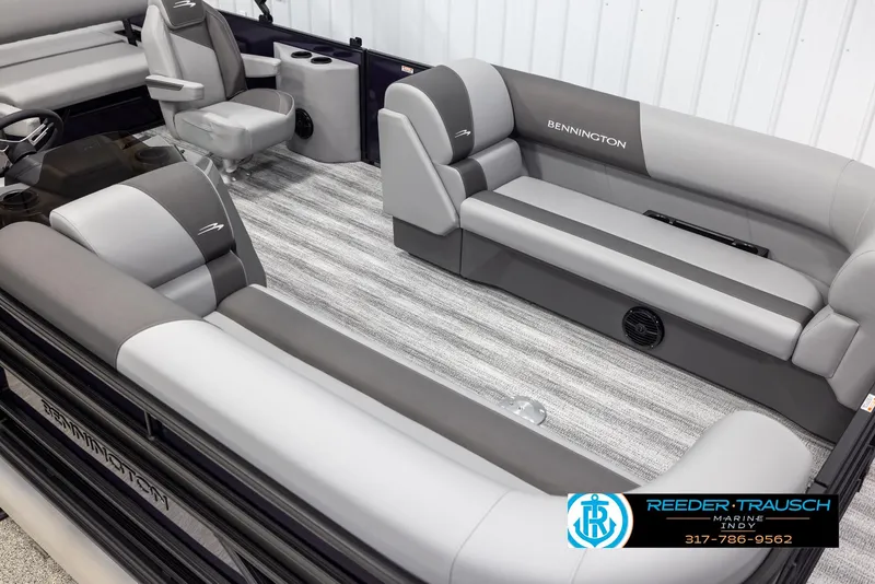 Slide: The Image of 2025 Bennington 21 SSB pontoon boat interior with gray seating and carpeted flooring. - 9