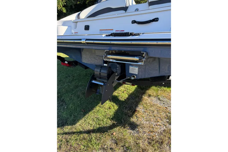 Slide: The Image of 2024 Yamaha Boats 195S rear view, showcasing the boat's sleek design and features. - 10