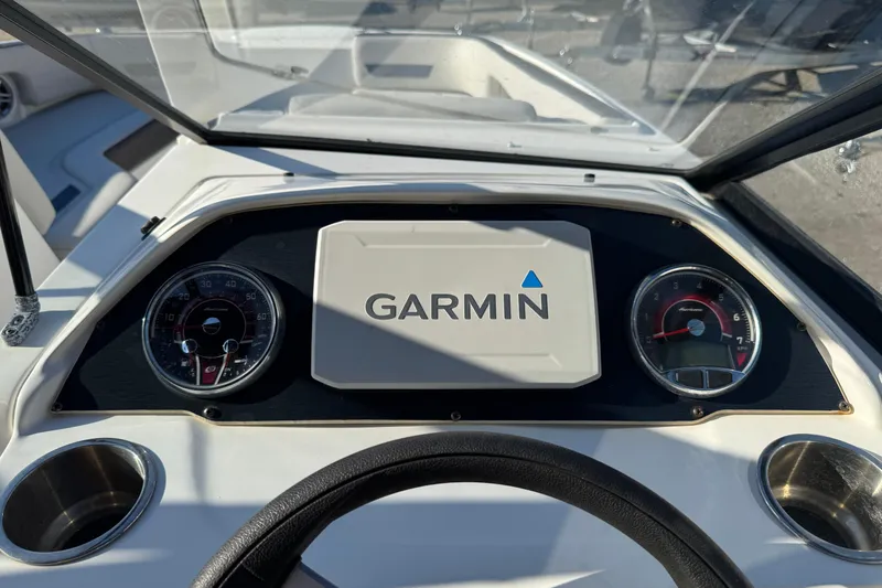 Slide: The Image of Dashboard of 2022 Hurricane SunDeck 235 OB with Garmin navigation system. - 22