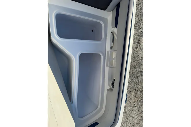 Slide: The Image of 2022 Hurricane SunDeck 235 OB boat storage compartment, featuring spacious design and sleek finish. - 28