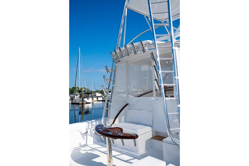 Slide: The Image of 2026 Front Runner 47WA yacht with sleek design and marina backdrop. - 12