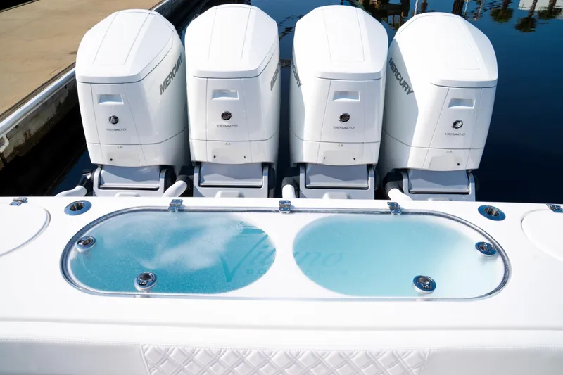 Slide: The Image of 2026 Front Runner 47WA boat with four Mercury Verado engines and a livewell. - 16