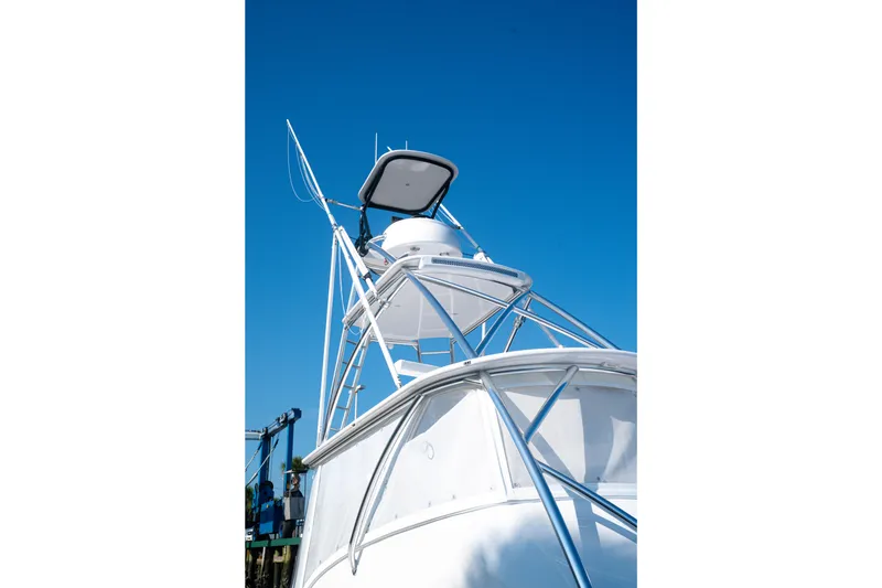 Slide: The Image of 2026 Front Runner 47WA boat tower against clear blue sky. - 34