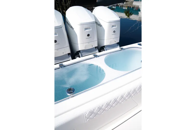 Slide: The Image of 2026 Front Runner 47WA boat with triple Mercury outboard engines and livewell. - 7