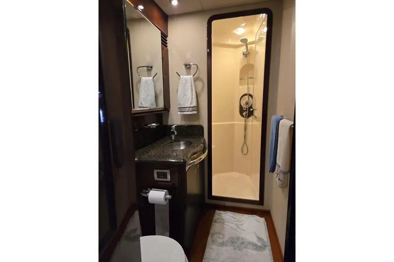 Slide: The Image of Luxurious bathroom in 2007 Sea Ray 580 Sedan Bridge yacht with shower and sink. - 30