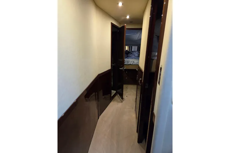 Slide: The Image of Hallway inside 2007 Sea Ray 580 Sedan Bridge yacht, leading to a bedroom. - 32