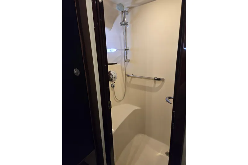 Slide: The Image of Shower area in 2007 Sea Ray 580 Sedan Bridge yacht, featuring sleek design and modern fixtures. - 35
