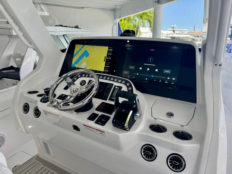 Slide: The Image of Intrepid 41 Panacea 2025 helm with advanced navigation and control systems. - 6