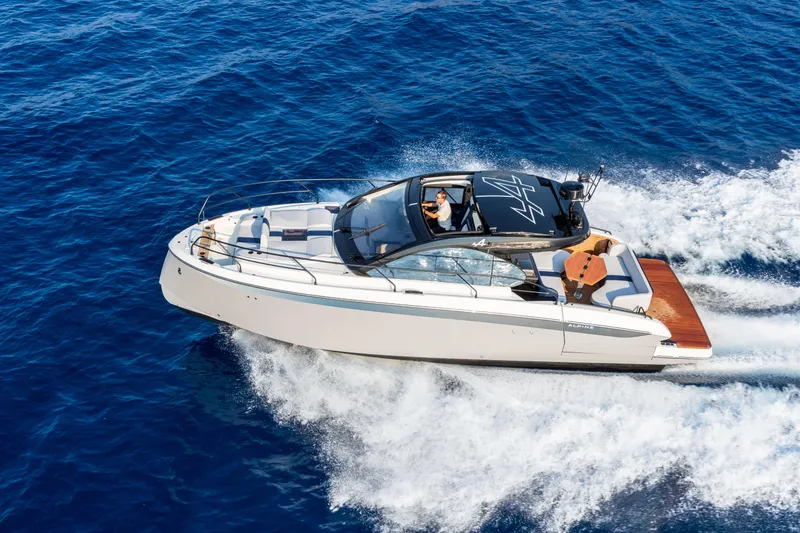 Slide: The Image of 2026 Beneteau Gran Turismo 40 yacht cruising on open blue sea. - 2