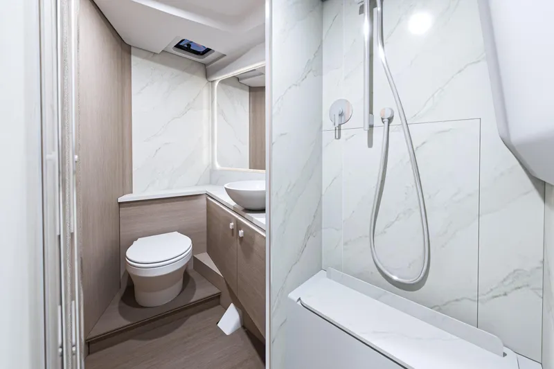 Slide: The Image of Luxurious cabin interior of 2026 Beneteau Gran Turismo 40 yacht, featuring modern design and cozy bedding. - 24