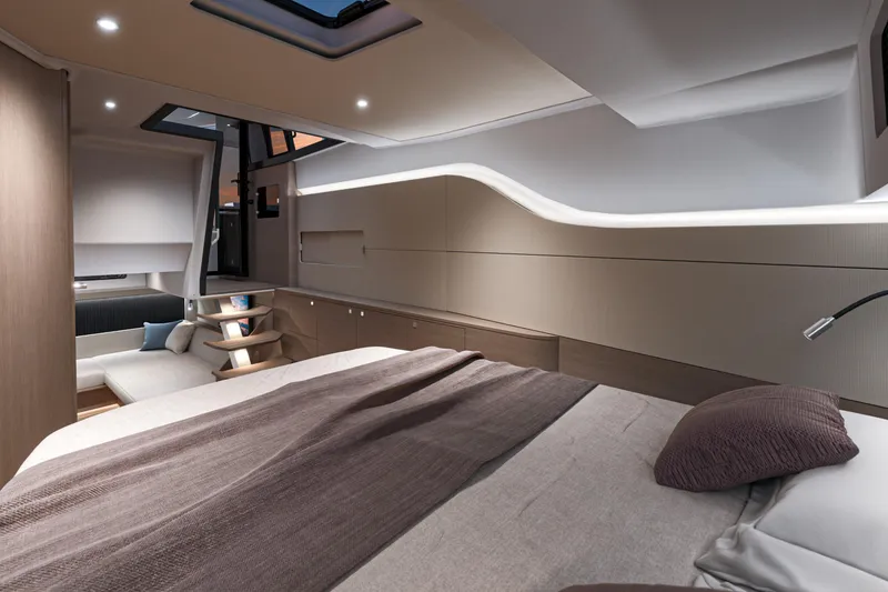 Slide: The Image of Luxurious interior of 2026 Beneteau Gran Turismo 40 yacht cabin, featuring modern design. - 27