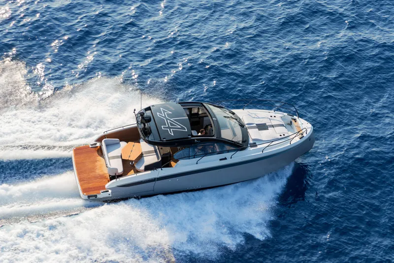 Slide: The Image of 2026 Beneteau Gran Turismo 40 yacht cruising on open blue sea. - 3