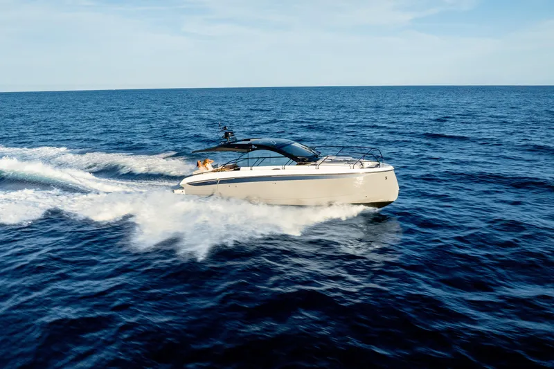 Slide: The Image of 2026 Beneteau Gran Turismo 40 cruising on open sea under clear skies. - 38