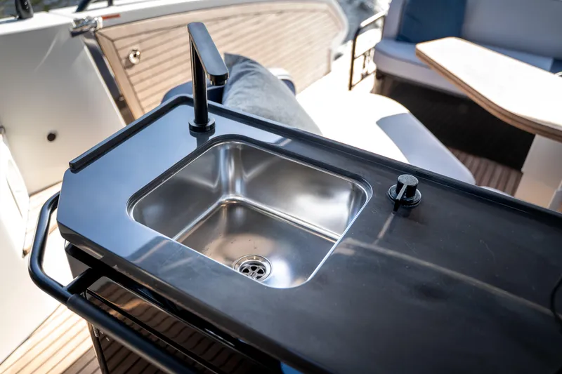 Slide: The Image of Luxury sink on 2026 Beneteau Gran Turismo 40 yacht, featuring sleek design and modern amenities. - 42