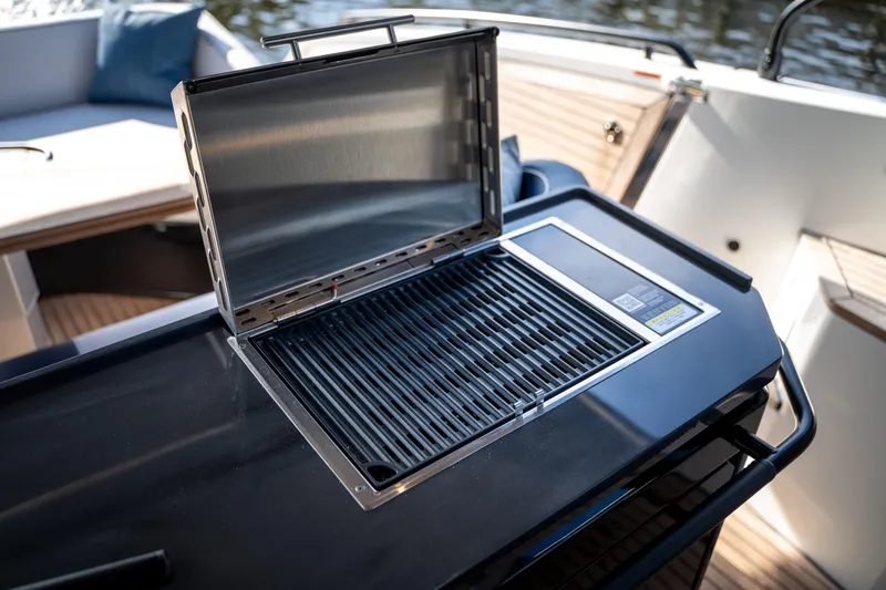 Slide: The Image of Outdoor grill on 2026 Beneteau Gran Turismo 40 yacht deck, ready for use. - 43