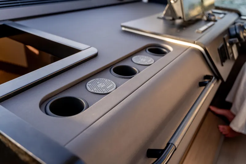 Slide: The Image of 2026 Beneteau Gran Turismo 40 yacht interior dashboard with modern controls and sleek design. - 46