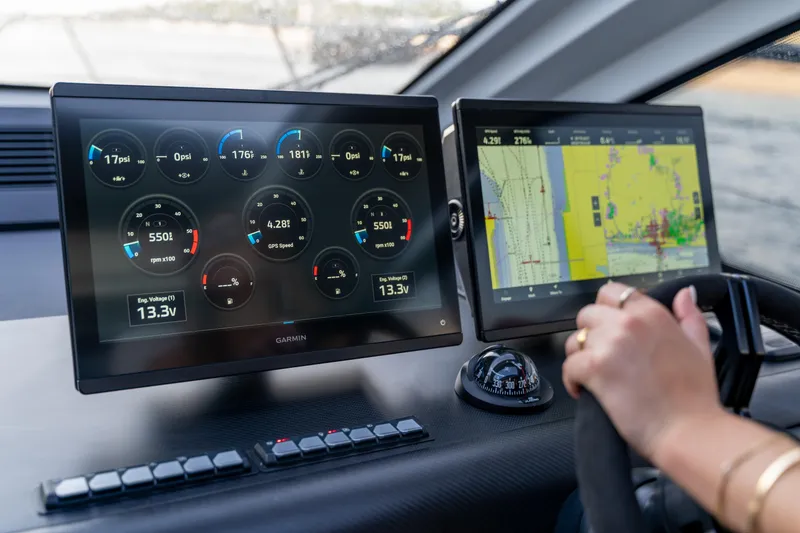 Slide: The Image of 2026 Beneteau Gran Turismo 40 dashboard with Garmin navigation and control screens. - 47